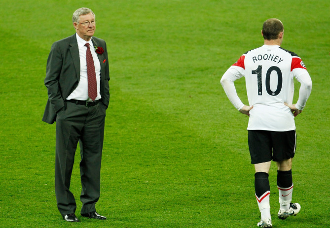 Ferguson (trái) hai lần thua Barca của Pep Guardiola ở chung kết Champions League 2009 và 2011. Ảnh: Reuters